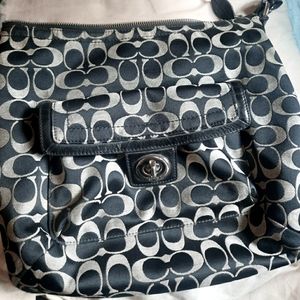 Signature Coach Penelope bag